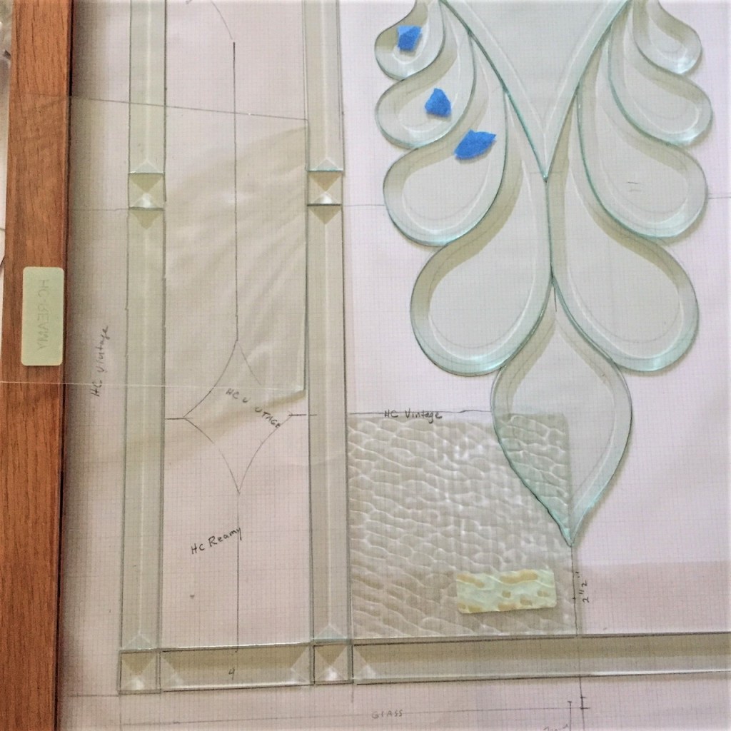 Beveled Glass layed out on board